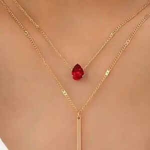 Elegant Gold Necklace with Ruby Red Pendant